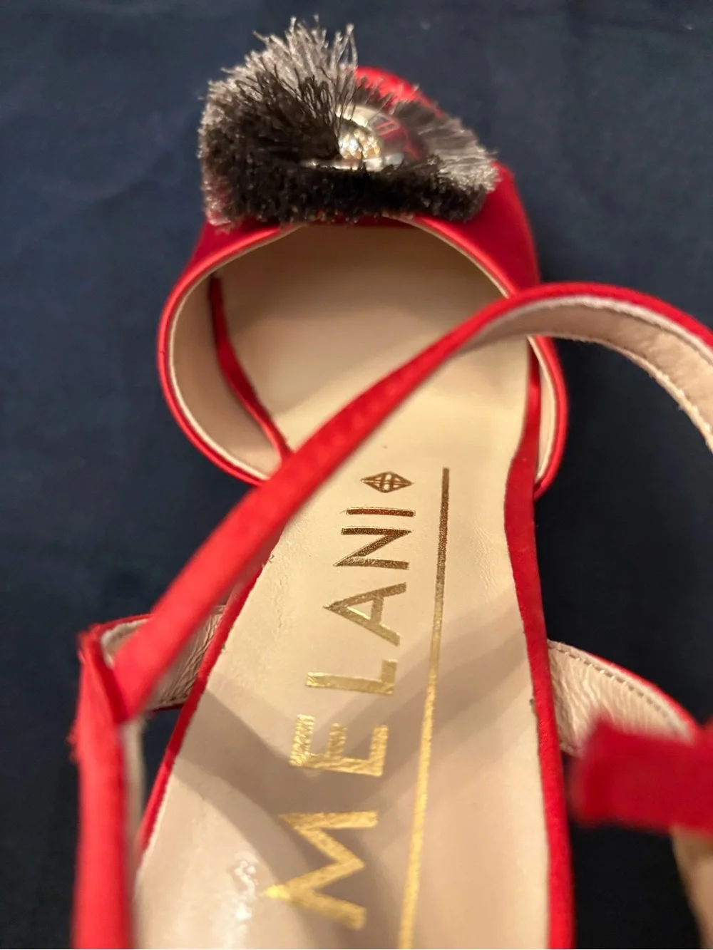 ANTONIO MELANI bold red
